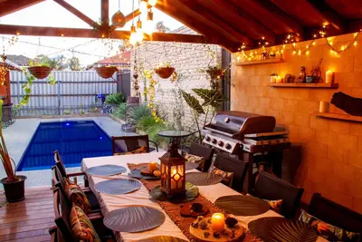 Image de Revive Spa Retreat\nbali Inspired House With Pool, Spa, Sauna & Outdoor Kitchen!