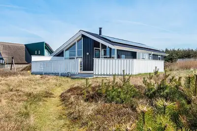 Image de Maison de vacances pour 9 a Harboøre-By Traum