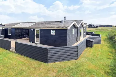 Image de Maison de vacances pour 12 a Løkken-By Traum