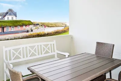 Image de Maison de vacances pour 4 a Fanø-By Traum