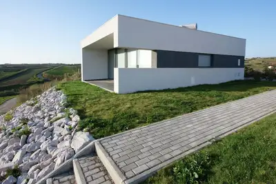 Image de Villa moderne avec magnifique vue, située dans un petit complexe avec piscine