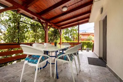 Image de Appartement de vacances avec Wi-Fi, climatisation