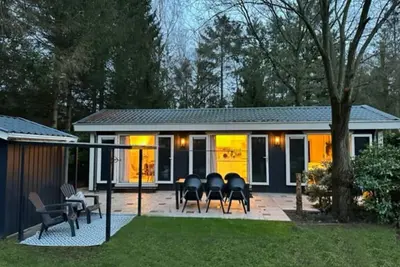 Image de On the Veluwe in the woods, Boho style, kids & dog welcome, large garden&terrace