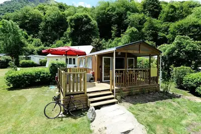 Image de Mobilhome Comfort 23m2 - 1 Schlafzimmer - halb überdachte Terrasse 18m2 + Bbq + Draps + Servietts 2 Personen