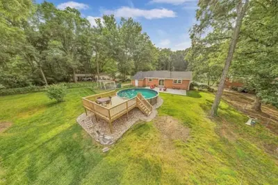 Image de 3 King Bedroom House with Pool in Charlott