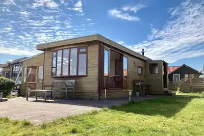 Image de Maison de vacances pieds dans l'eau Sonnenschein 3 personnes avec sauna