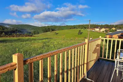 Image de Chalet 'En Bois Tout Confort' avec vue sur montagne, terrasse privée et jardin privé