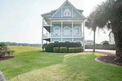 Image de Hobbs Realty - “Paradise on the Marsh” | Pool, Fire Pit & Stunning Icw + Marsh Views