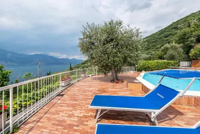 Image de Appartement 'Villa Verde' avec vue sur le lac, piscine partagée et climatisation