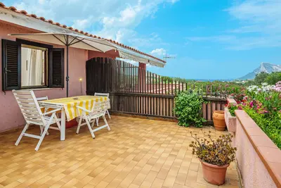Image de Maison de vacances 'Villetta Meyer Lu Pitrali' avec vue sur la mer, terrasse et jardin privés