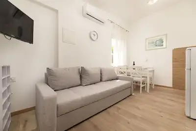 Image de Appartement de vacances Njivice pour 1 - 4 personnes avec 1 chambre Ă coucher - Appartement de vacan