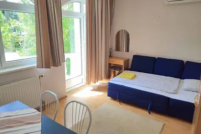 Image de Appartement de vacances avec WiFi et climatisation près de la plage gratuite