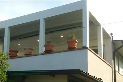 Image de Votre escapade estivale : Appartement chaleureux avec terrasse véranda
