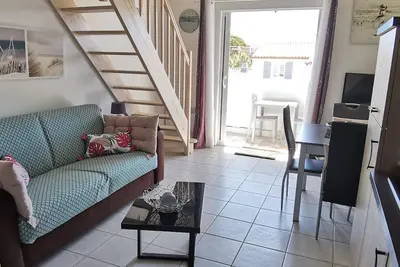 Image de Appartement cosy Ă 100m de la plage avec mezzanine, terrasse et parking privatif