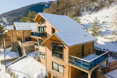 Image de Chalet moderne pour 4-6 pers avec terrasse Ă Pra Loup, vue montagne