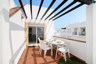 Image de Appartement 'Quinta Gomeira 74' avec vue sur la mer, piscine partagée et climatisation