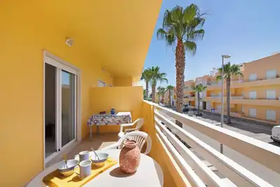 Image de Appartement 'Royal Cabanas Golf 88' avec piscine partagée, jardin partagé et climatisation