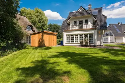 Image de Ferienhaus mit Sauna und Garten in Ruhiger Lage
