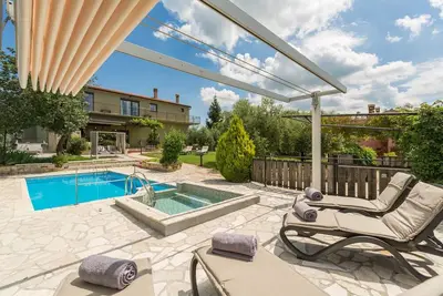 Villa Vital with private pool, jacuzzi, children playground and billiard in Vižinada