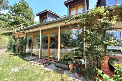 Image de Maison de vacances \"Charmante Maison Familliale Lac\" avec vue sur le lac et jardin privé
