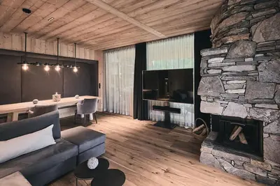 Image de Chalet \"Waldchalet mit Jacouzzi\" avec vue sur la montagne, terrasse privée et Wi-Fi