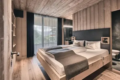 Image de Chalet \"Ruhiges Waldchalet\" avec vue sur la montagne, terrasse privée et Wi-Fi