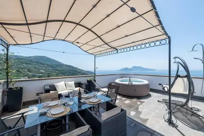 Image de Torre del Saraceno, in Massalubrense, with  sea view, outdoor Jacuzzi, 6 sleeps.