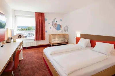 Image de Gitterbettzimmer Thermenseitig - H2o Hotel Therme Resort