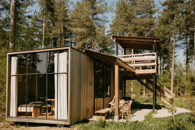 Cabin with covered terrace at a height of 3. 5 metres