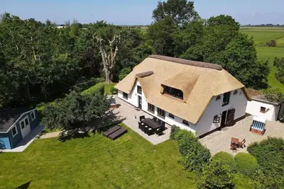 Image de Reetdachhaus Friesen Chalet