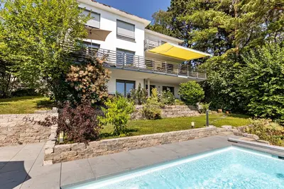 Image de Appartement \"Am Lichtenberg\" avec vue sur le lac, terrasse privée et Wi-Fi