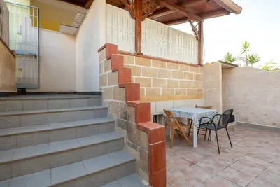 Image de Appartement Acquadolce accueillant pour les animaux de compagnie, avec vue sur la mer et terrasse