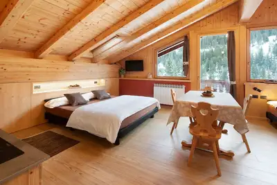 Image de Appartement 'Chalet Primula 13' avec vue sur la montagne, jardin partagé et Wi-Fi