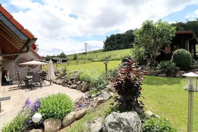 Image de Flechtdorfer Waldblick - 130 square meter vacation home and large property, stream and terrace for 6 guests
