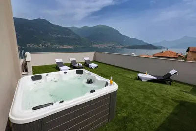 Image de 5½-room house with outdoor whirlpool and fantastic lake view