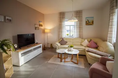 Image de Das Ferienhaus Rena Steht im Wunderschönen Krummhörner Warfendorf Manslagt, nur