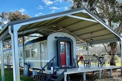 Image de A unique sleeper train carriage near Bathurst that's off the rails! \n