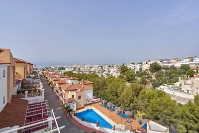 Image de Appartement de vacances \"Nerja\" avec vue sur la mer, piscine partagée et Wi-Fi