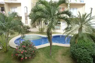 Image de Bright and Clean 2 Bedroom Condo in Villa Verde Ii, 5 min walk to beach