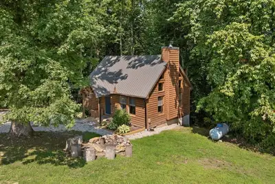 Inviting, charming 2br, log cabin located in the Scenic Heights neighborhood.