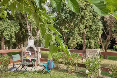 Image de Mini-villa de vacances confortable, proche de la mer, avec jardin et piscine en commun