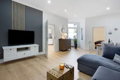 Image de Appartement 'KĂĽstenzauber - Balkon - Top Lage' avec terrasse, balcon et Wi-Fi