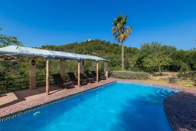 Image de Maison de vacances \"Es Colomer\" avec vue sur les montagnes, piscine partagée et Wi-Fi