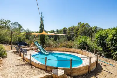 Image de Appartement de vacances \"Es Mulí\" avec vue sur la montagne, piscine partagée et Wi-Fi