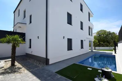 Image de Appartement de vacances Njivice pour 1 - 4 personnes avec 2 chambres Ă coucher - Appartement de vaca