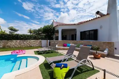 Image de Vila com piscina privada, perto da praia  e WiFi