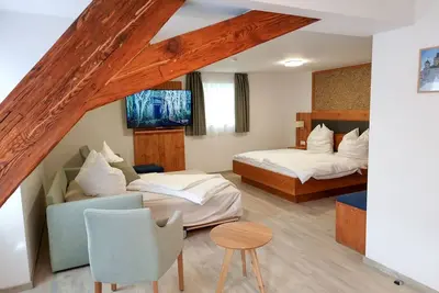 Image de Apartment mit Deckenbalken