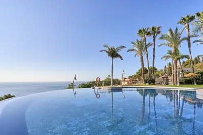 Image de Maison de vacances 'Casa Palmeras' avec vue sur la mer, Wi-Fi et climatisation