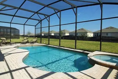Image de 6/4 Home Pool/Spa Close to Disney, Free Water Park Use, Game room.