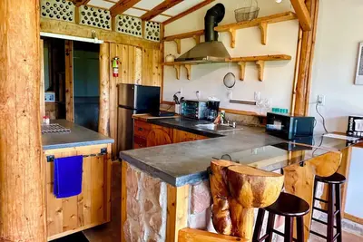 Natural Home Built in Earthship Style on Waterfront Property